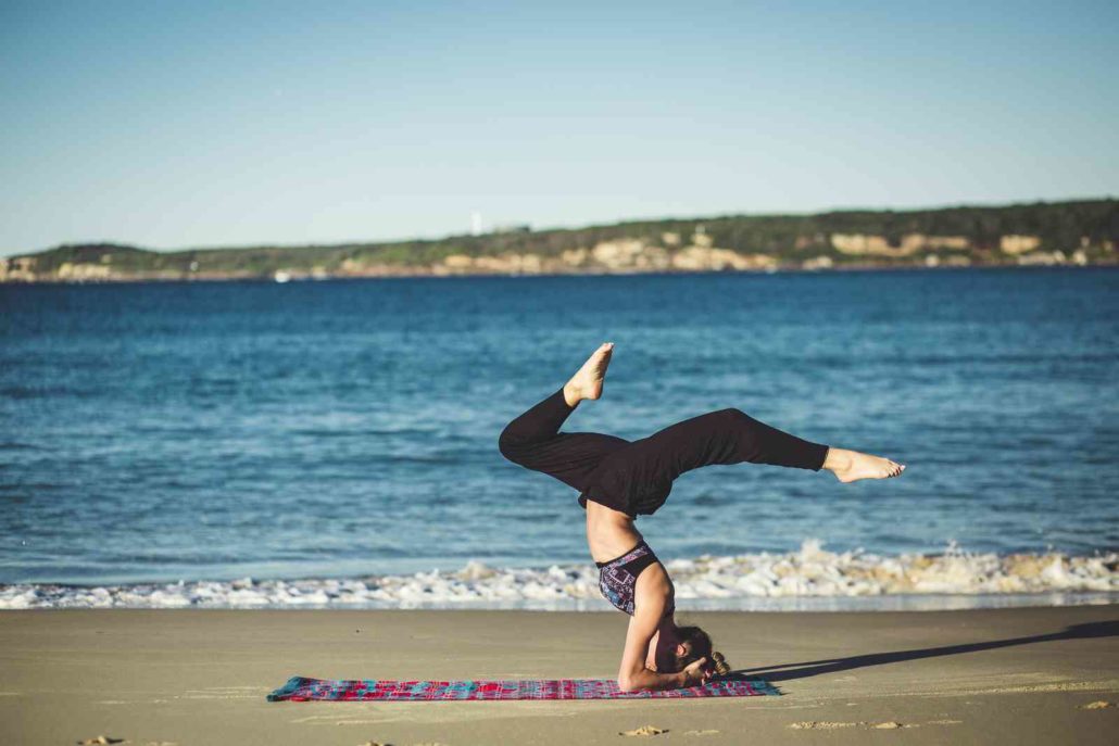 Private Krankenversicherung Yoga am Strand